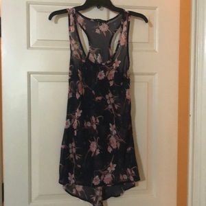Sheer, floral racer back tank with shirttail hem